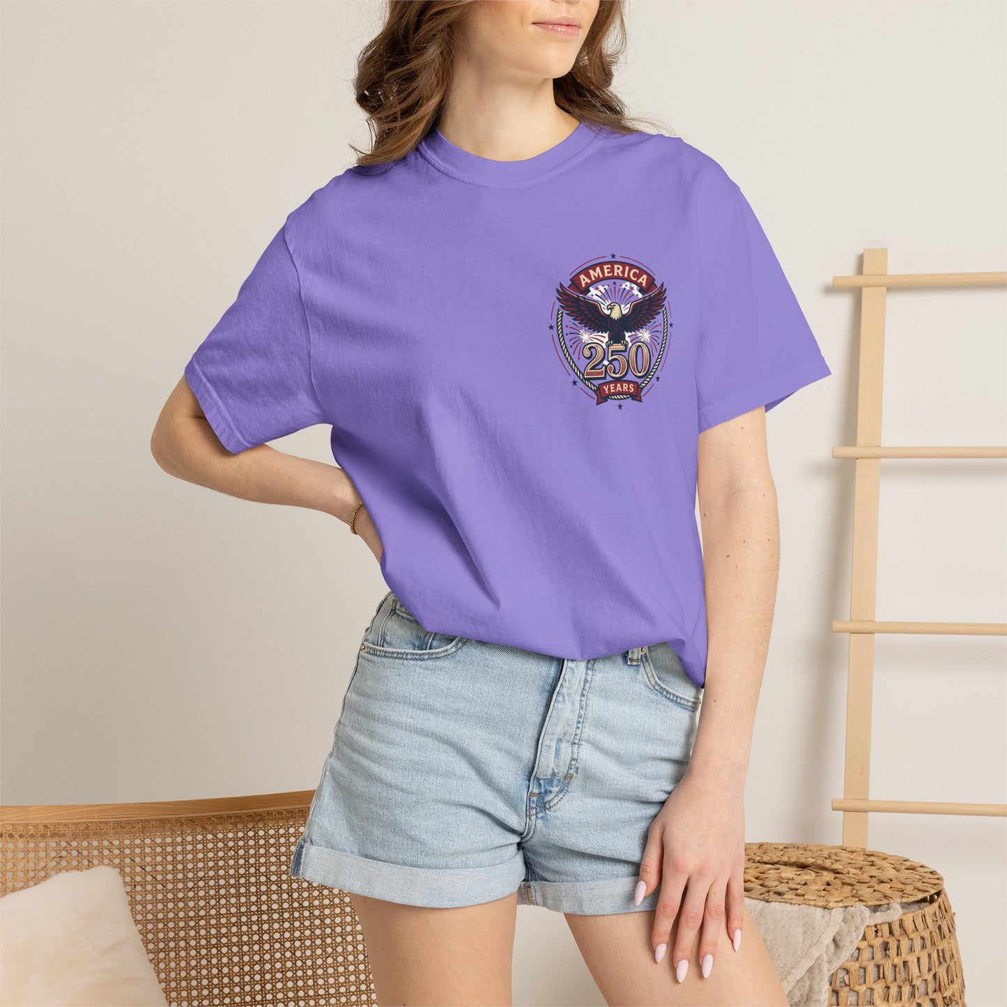 Lavender T-shirt with America 250 circular eagle logo on chest, crew neck