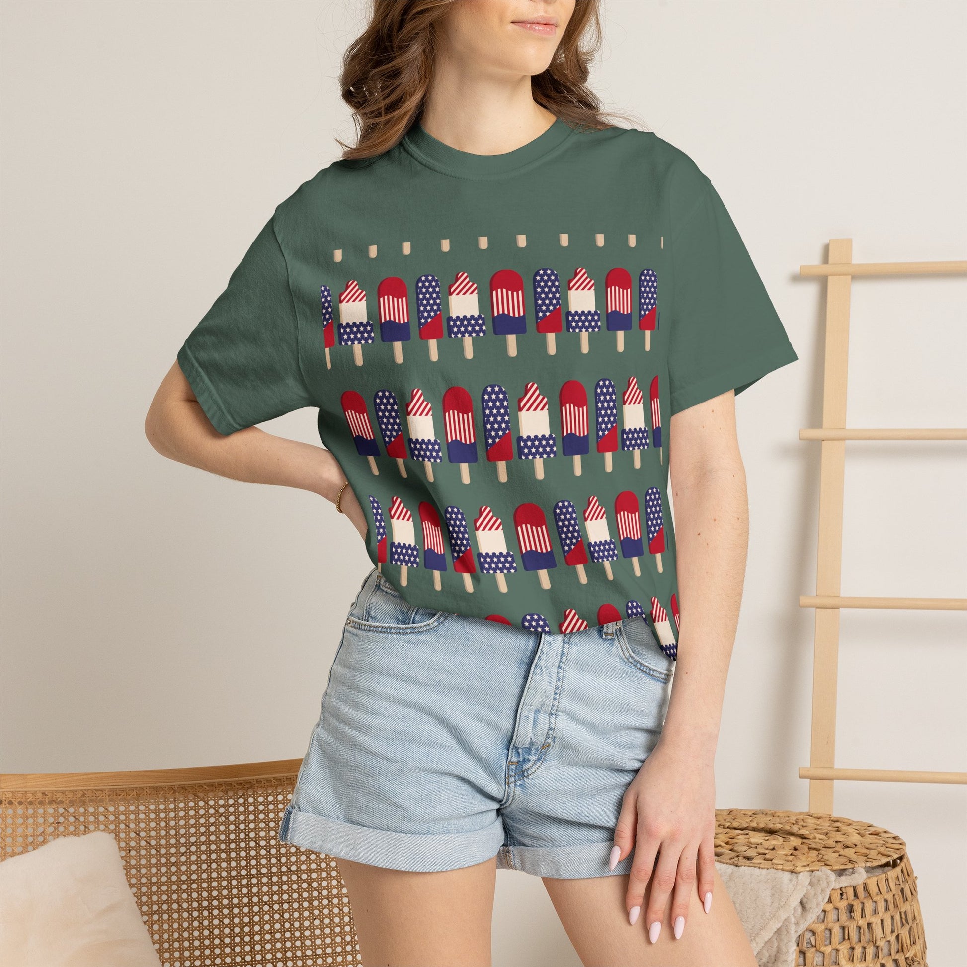 Green crew-neck T-shirt with popsicle-style American flags pattern on front.