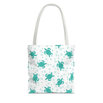 Sea turtle pattern tote bag with teal turtles on white background and light gray handles