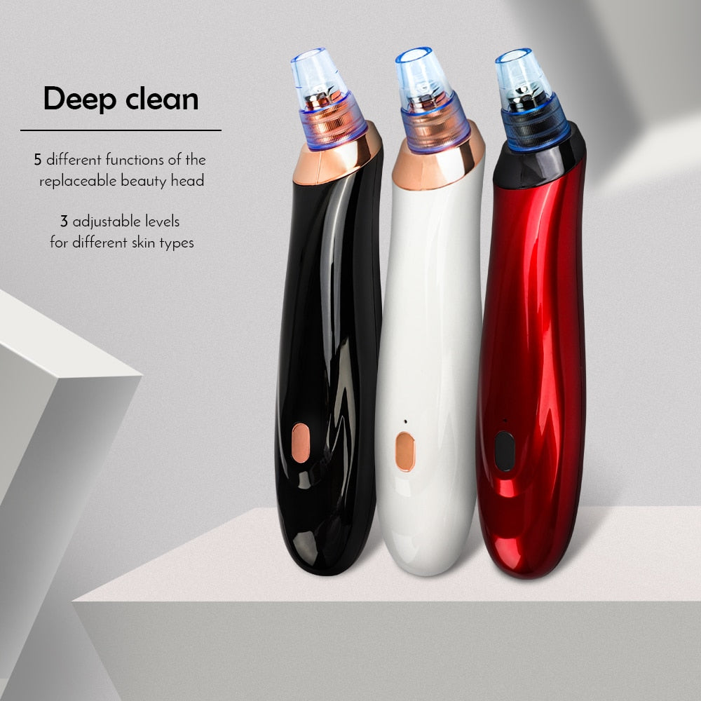 Electric blackhead remover with three interchangeable heads in black, white, and red.