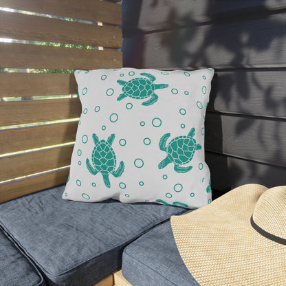 Outdoor sea turtle pillow, white fabric with teal turtles and circle pattern