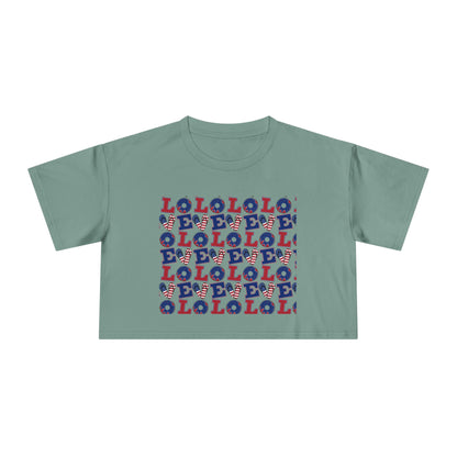 Sage green graphic crop tee with multicolor “LOL” block print
