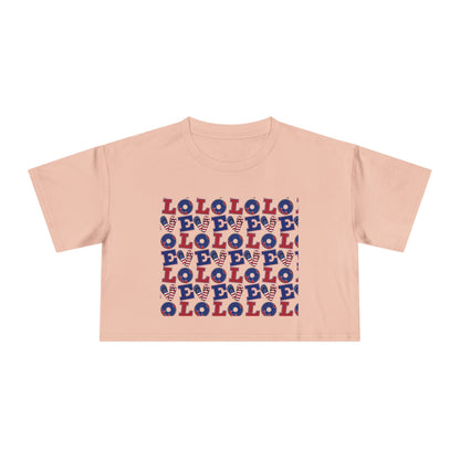 Pale pink graphic crop tee with multicolor “LOL” block print