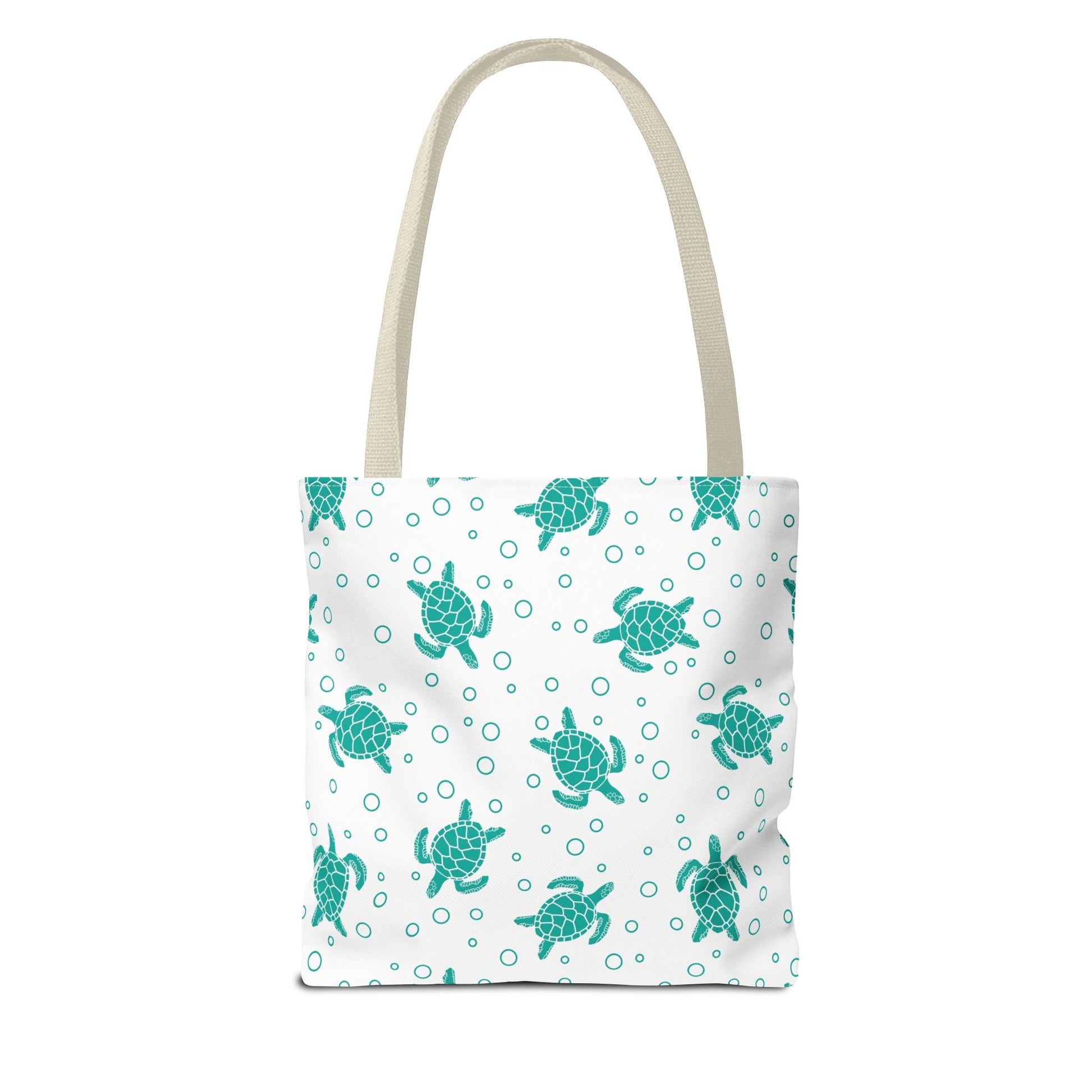 Sea turtle print tote bag with teal turtles on white, beige carry handles