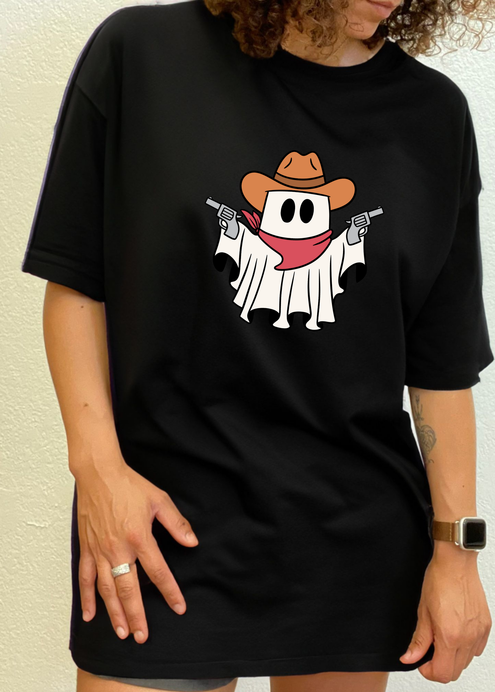 Men's black graphic T-shirt with cowboy ghost face and revolver print on center chest.
