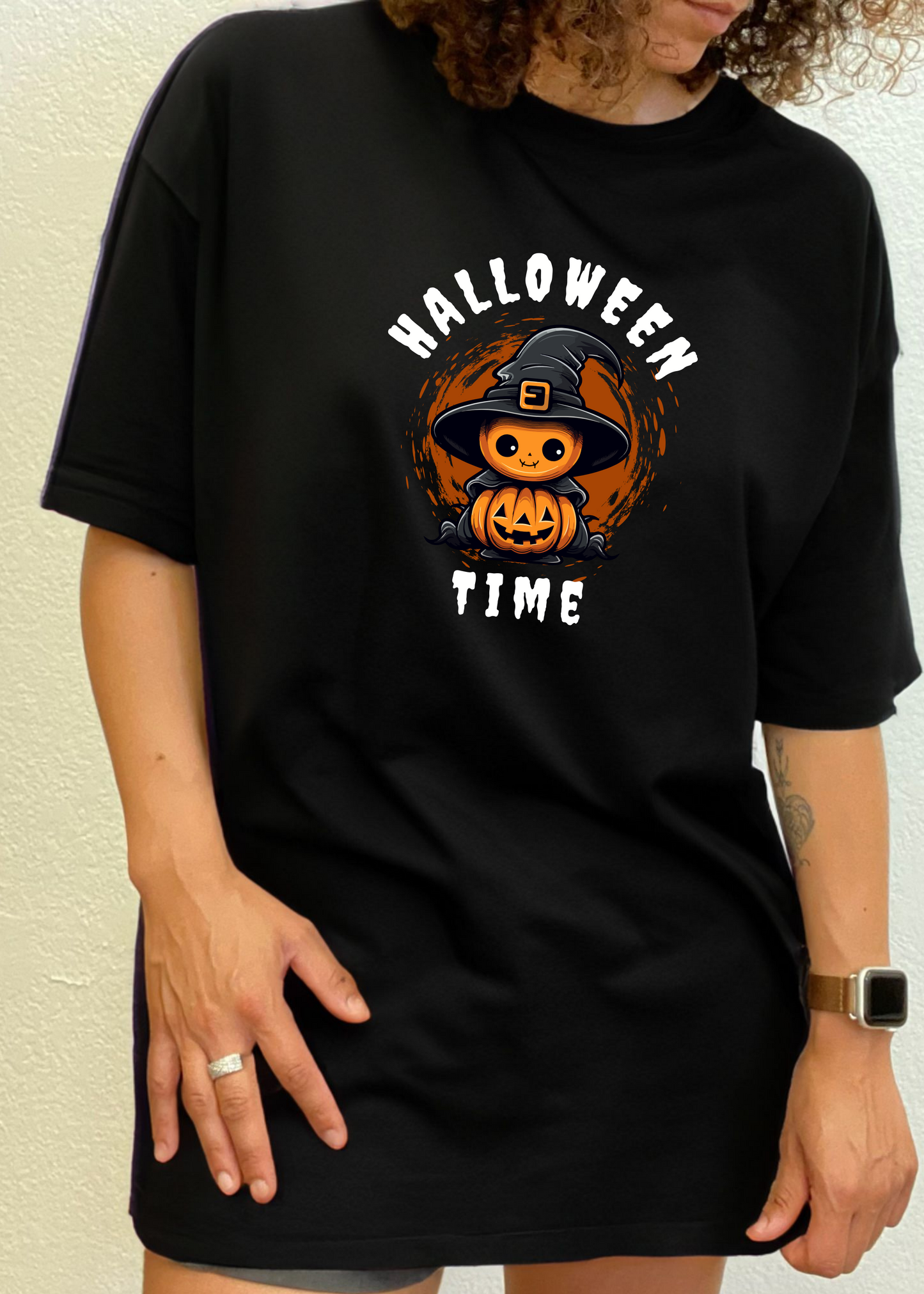 Unisex Halloween graphic T-shirt, crew neck; black short sleeve with witch-pumpkin front print