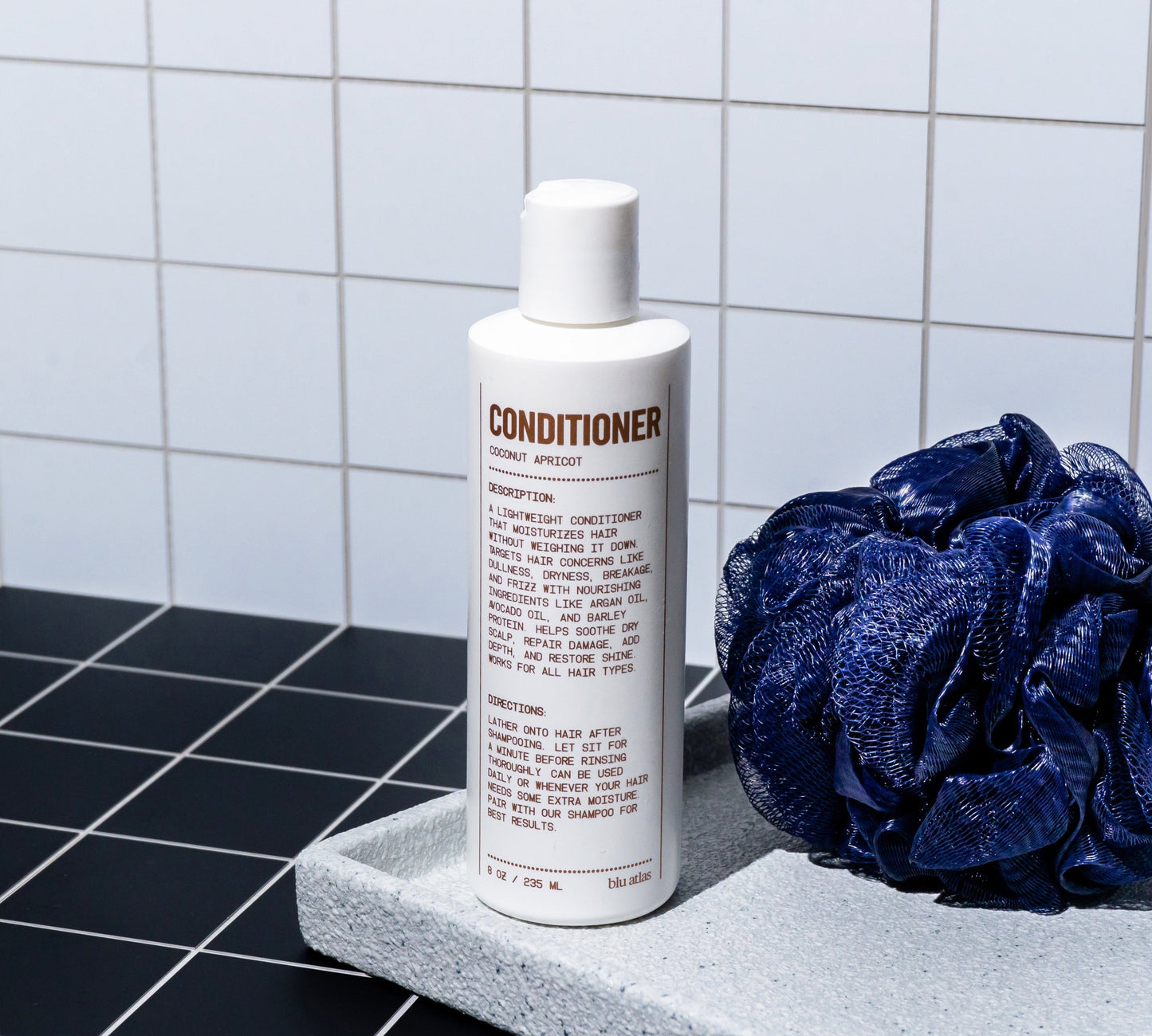 Soothing and Smoothing Natural Conditioner bottle with pump, front label visible