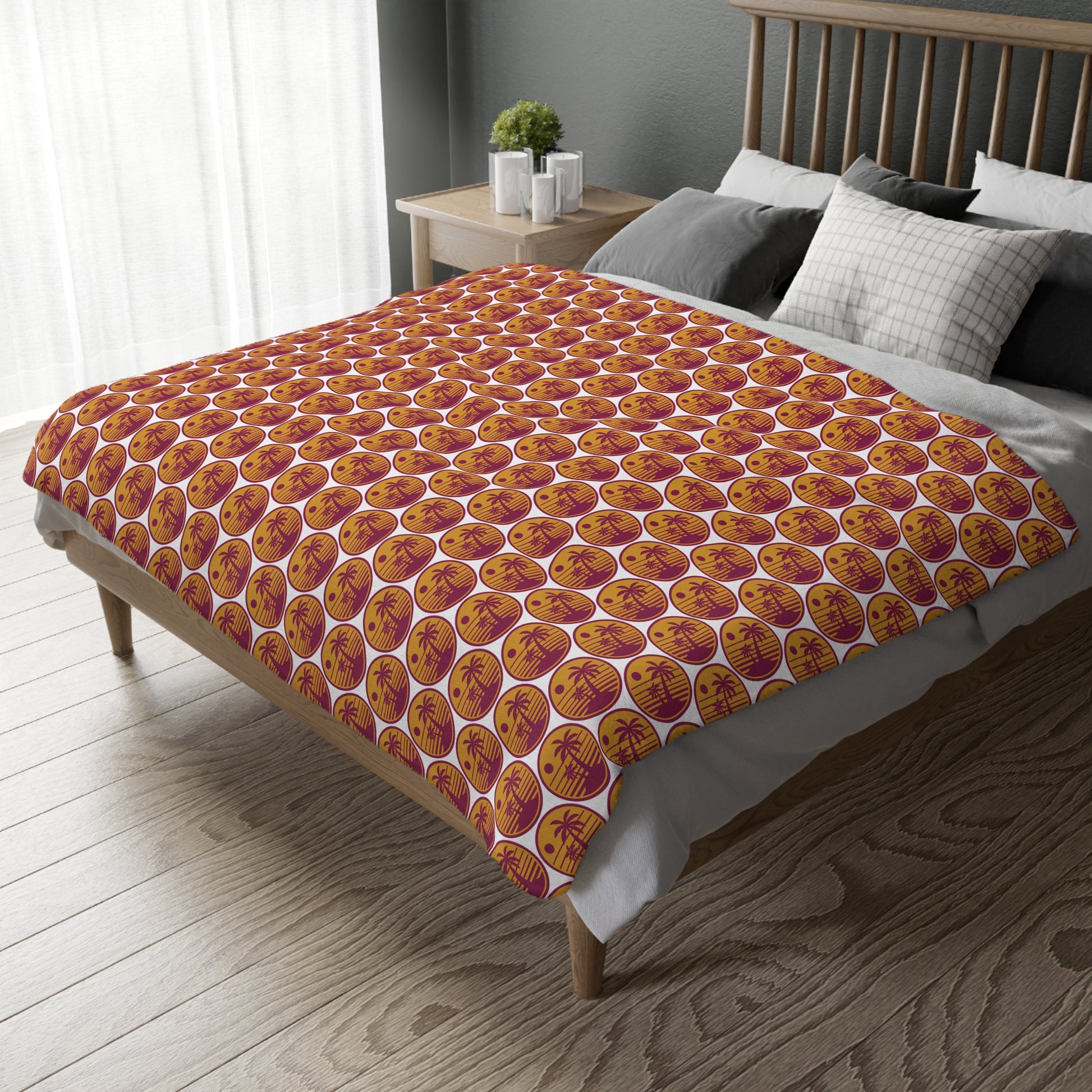 Pumpkin-pattern throw blanket in orange with cream and gold motifs