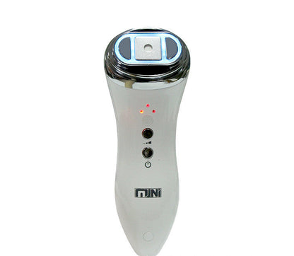 Handheld facial beauty apparatus, white body, chrome head with blue LED ring and power controls