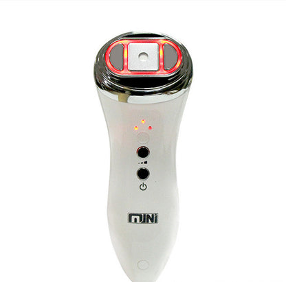 Handheld facial beauty apparatus, white body, chrome head with red LED ring and indicator lights