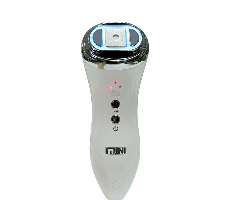 Handheld facial beauty apparatus, white body, chrome head with blue LED ring and two control buttons