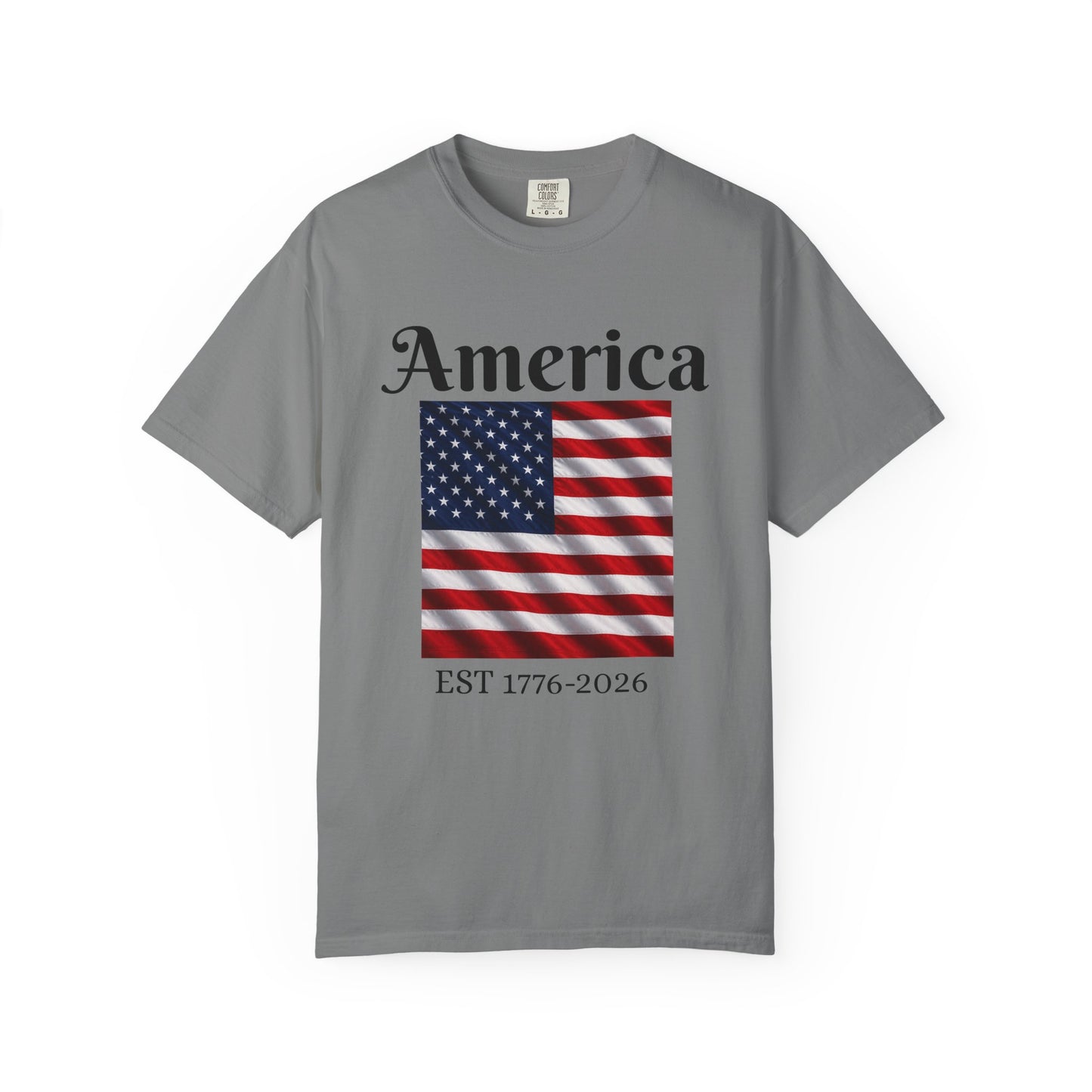 Heather gray T-shirt with “America” over US flag and “EST 1776-2026” graphic on front