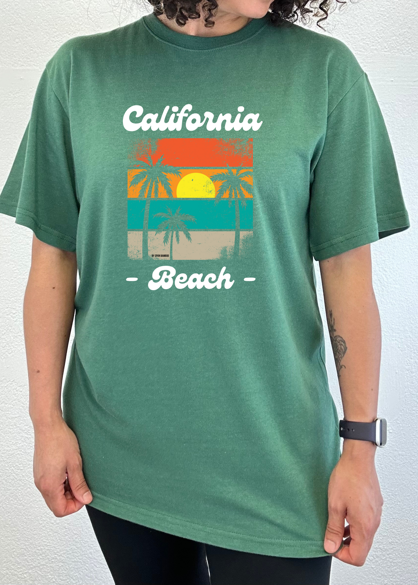 Unisex graphic T-shirt, teal green with 'California Beach' palm print