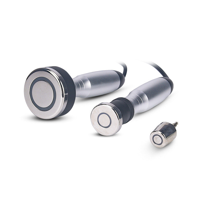 RF beauty device electrode handles—two silver cylinders with black end tips