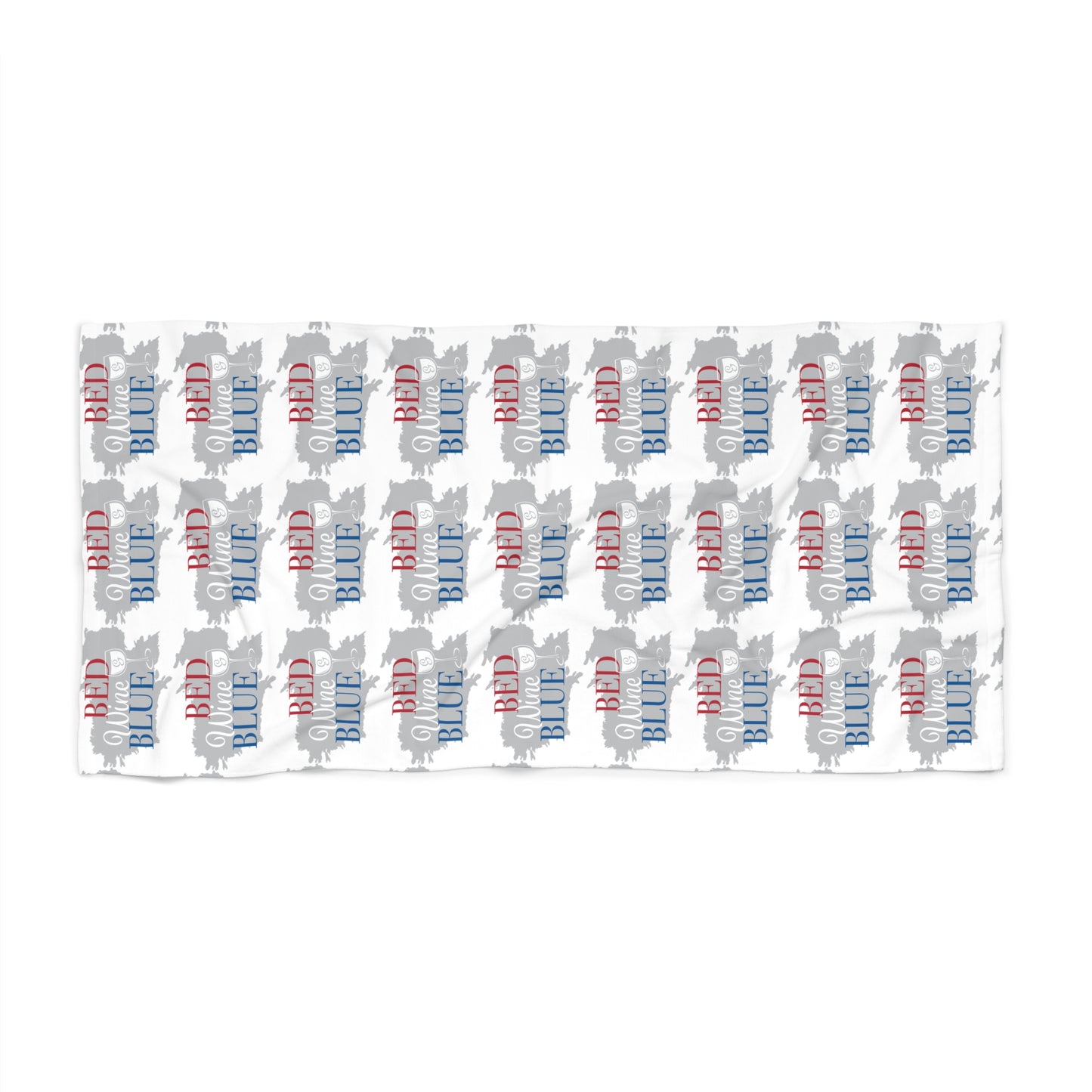 White beach towel with repeating red and blue script pattern