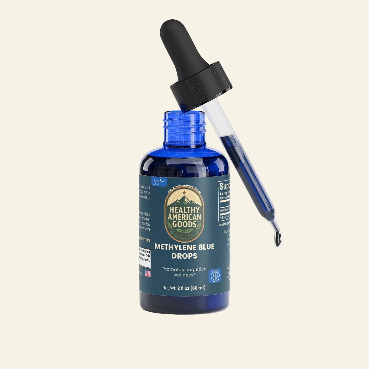 Methylene Blue drops bottle with black dropper cap, blue glass container