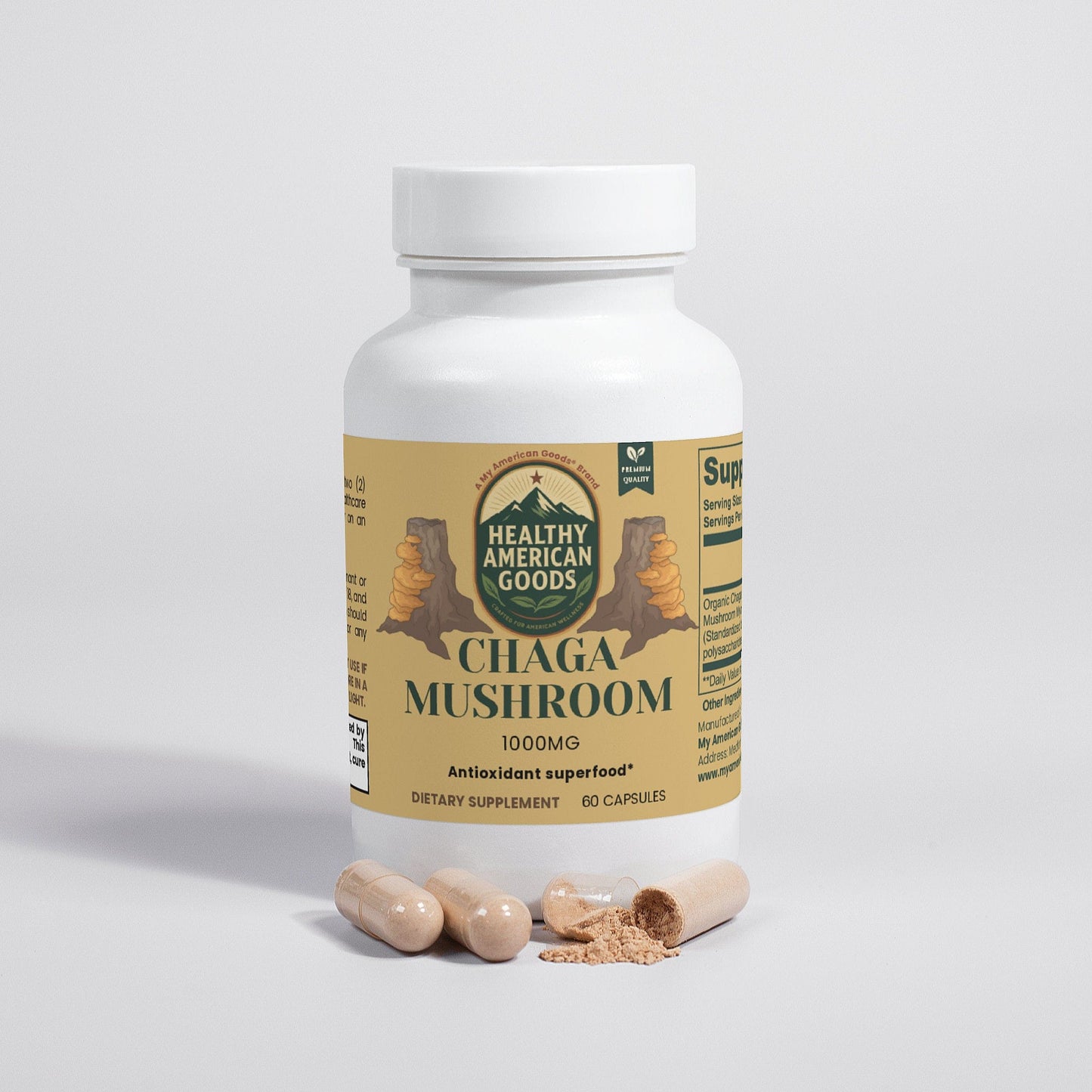 Chaga mushroom dietary supplement bottle with capsules and powder on the surface.