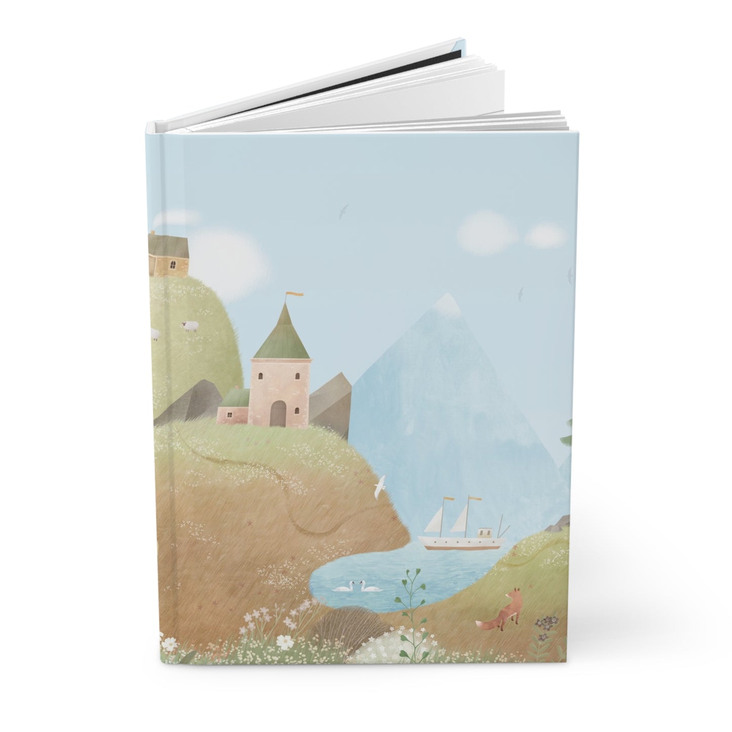 Hardcover journal with countryside cover illustration; pages visible at top