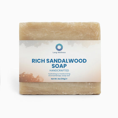 Rich sandalwood soap bar, beige and white label facing forward