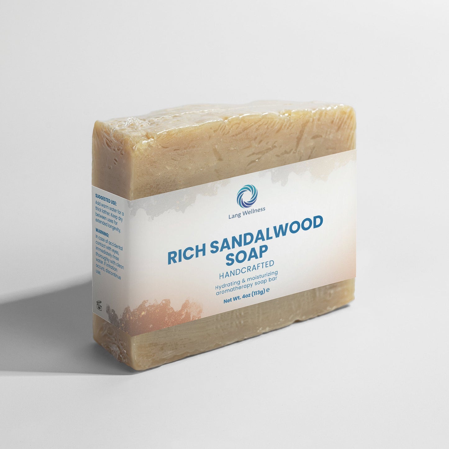 Rich sandalwood soap bar, beige rectangular block with white front label