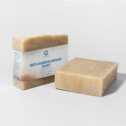 Rich sandalwood soap bars, beige blocks with front and side labels