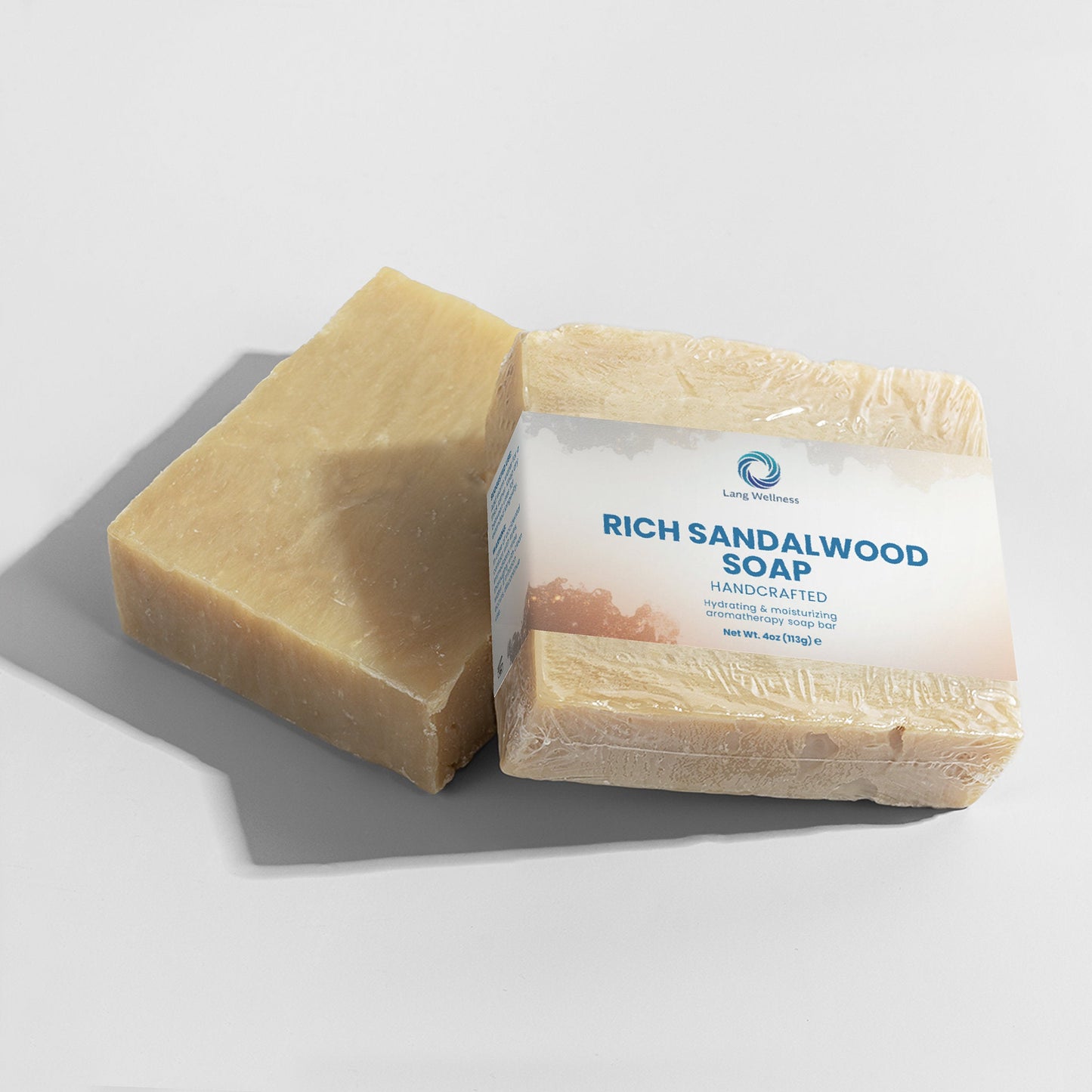 Rich sandalwood soap bars, beige blocks with labels on the top and front