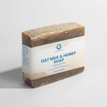 Oat milk & honey soap bar, rectangular brown bar with white label on wrap