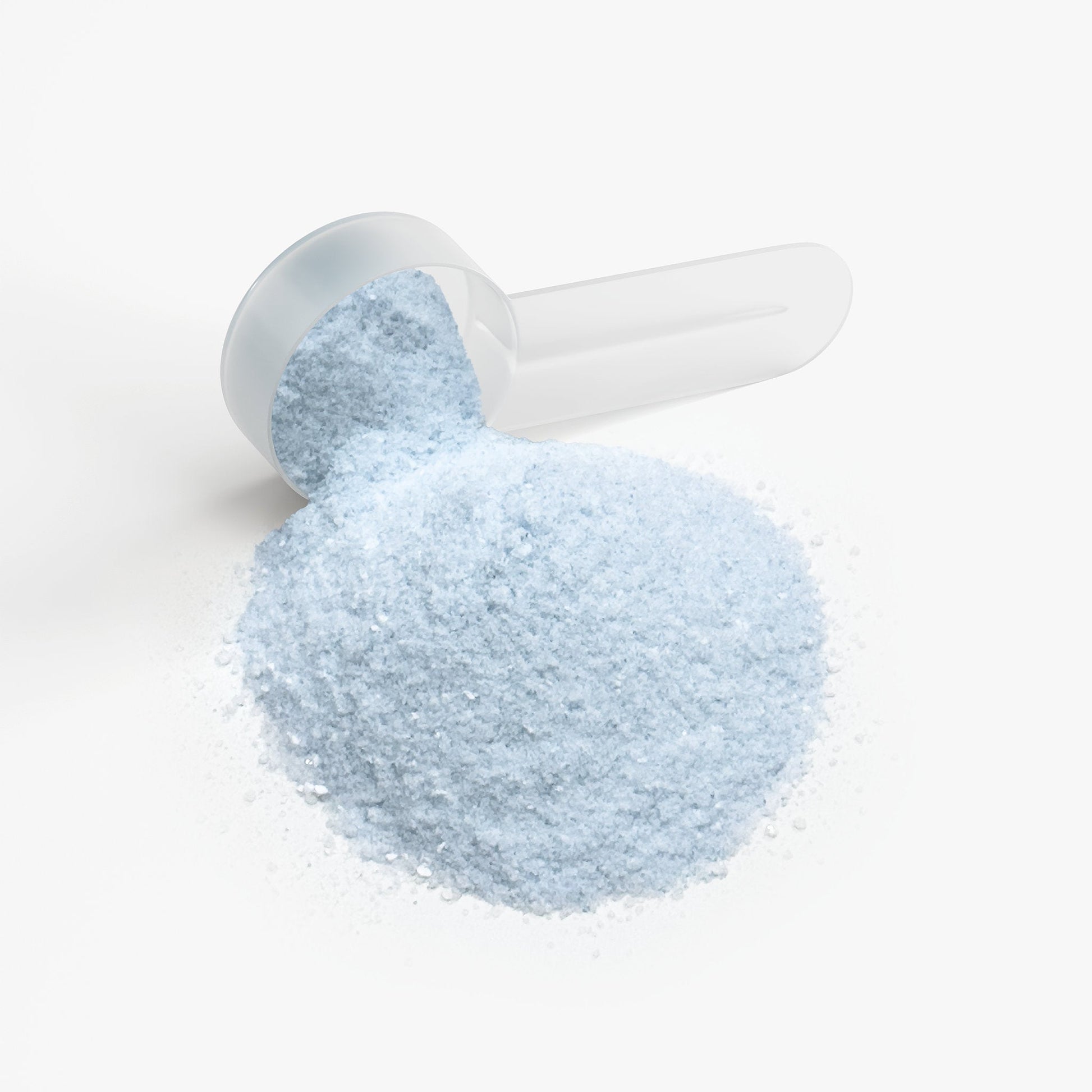 Plastic scoop filled with light blue cotton-candy powder