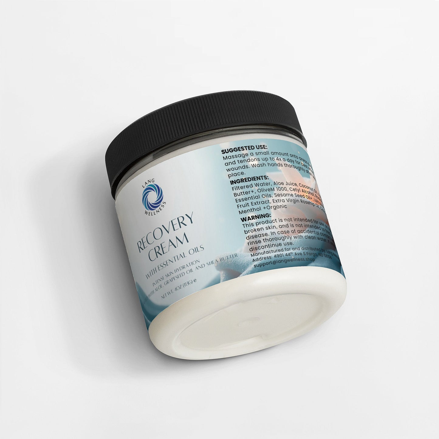 Recovery cream jar shown from a side angle with black lid and back label text