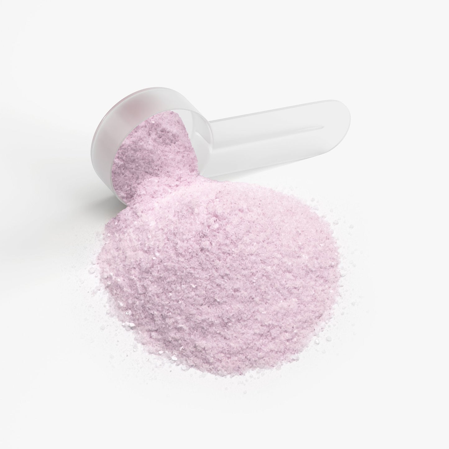 Powder scoop holding light pink supplement powder
