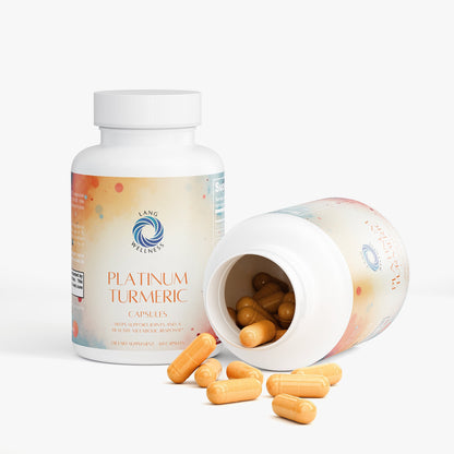 Turmeric capsules bottle with open lid; orange capsules spilling out