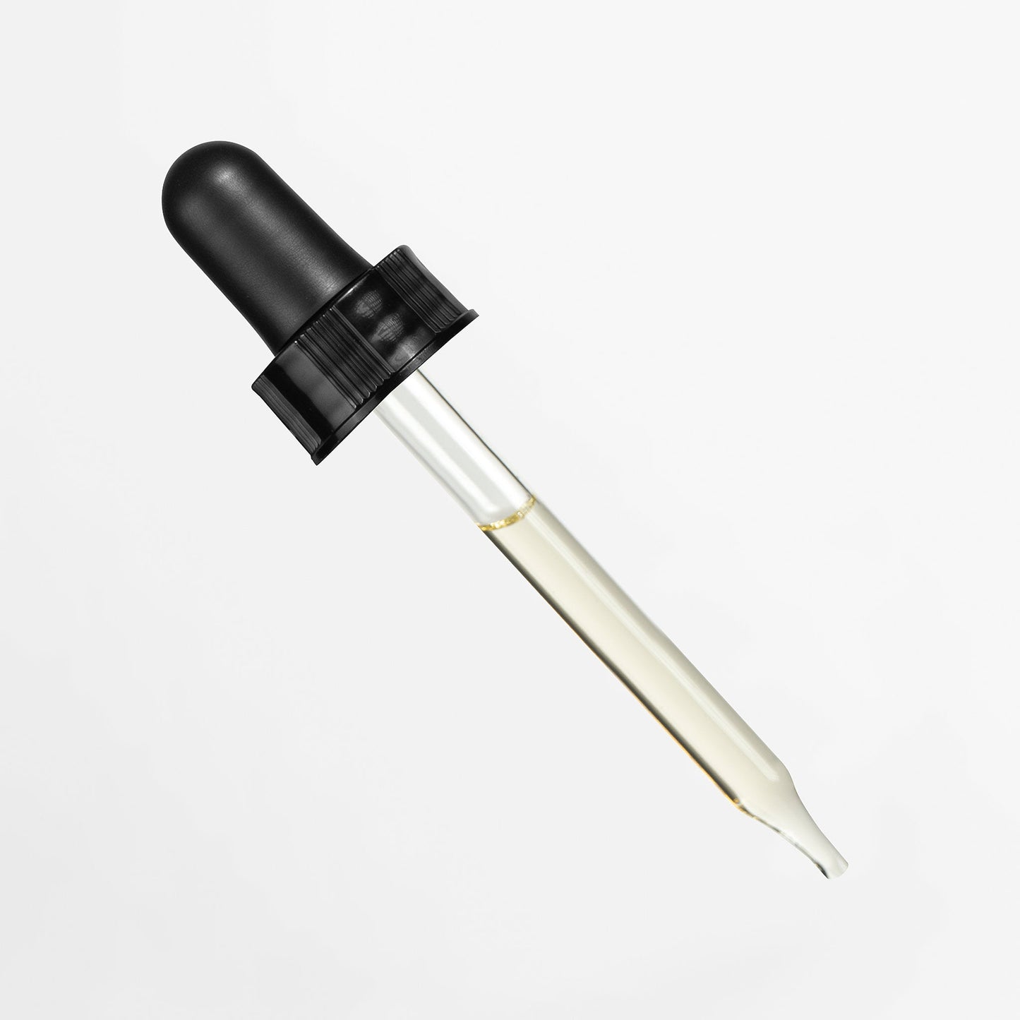 Dropper pipette with a small amount of clear oil