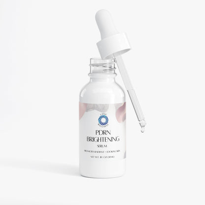 PDRN brightening serum bottle with white dropper cap