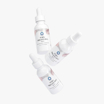PDRN brightening serum set of bottles with droppers arranged diagonally