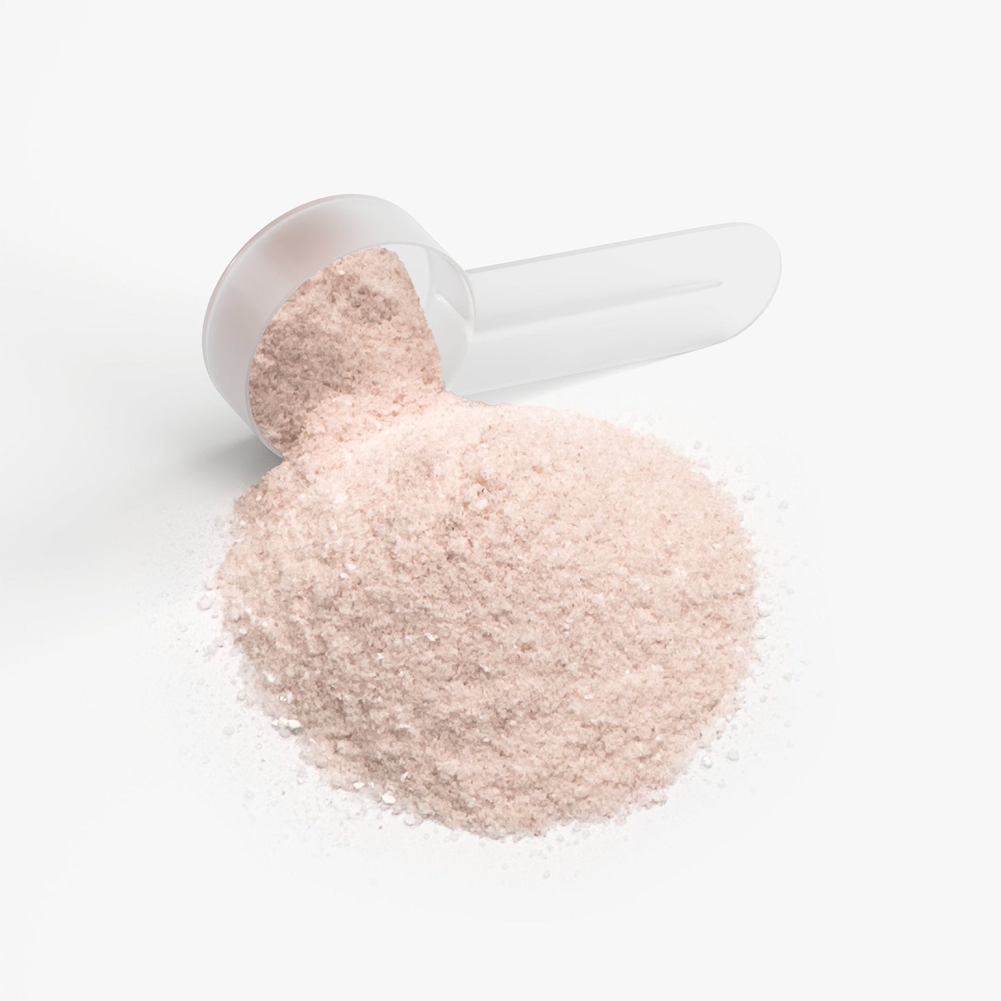 Plastic scoop filled with light beige powder