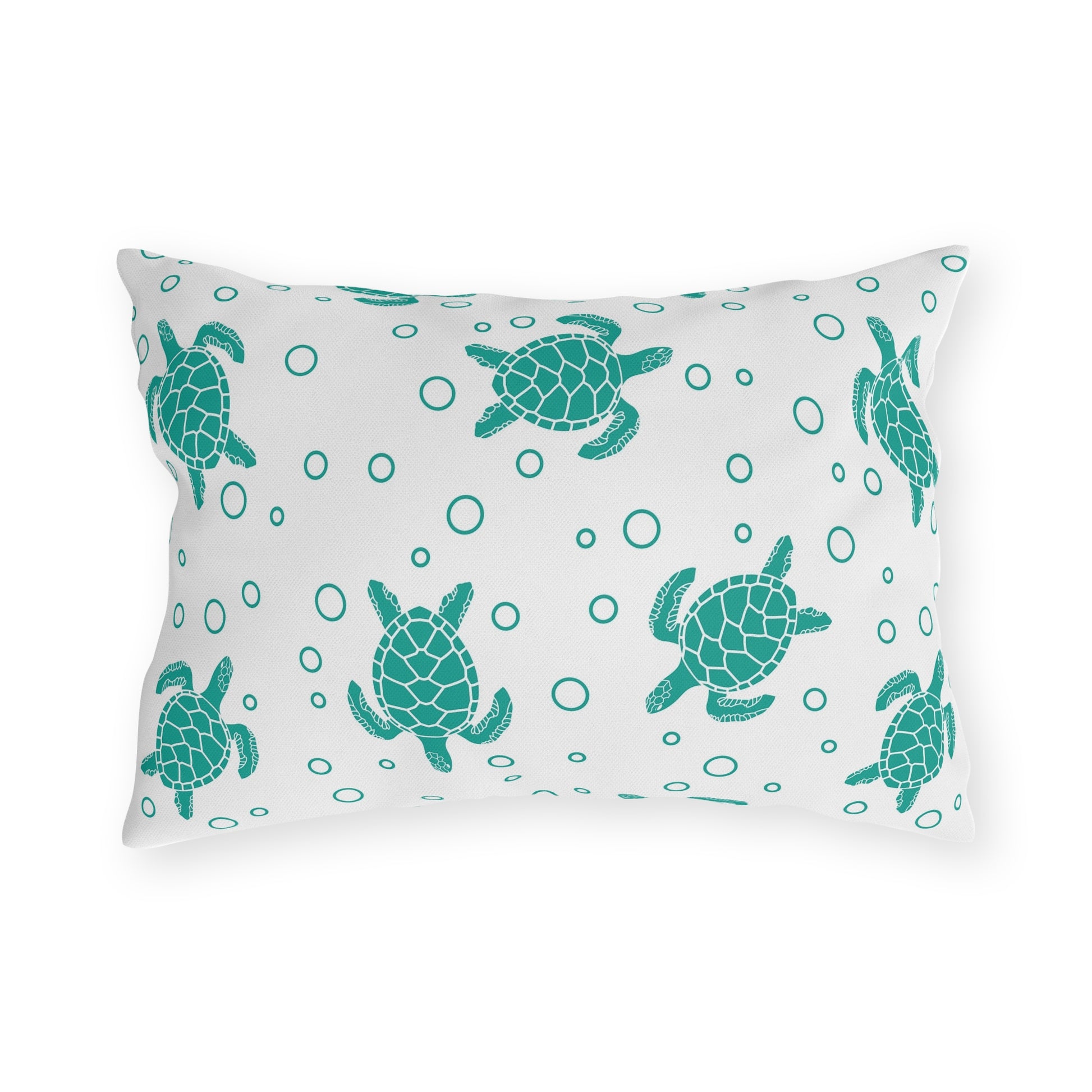 Square outdoor cushion pillow with teal sea turtles and ring-dot pattern on white cloth.