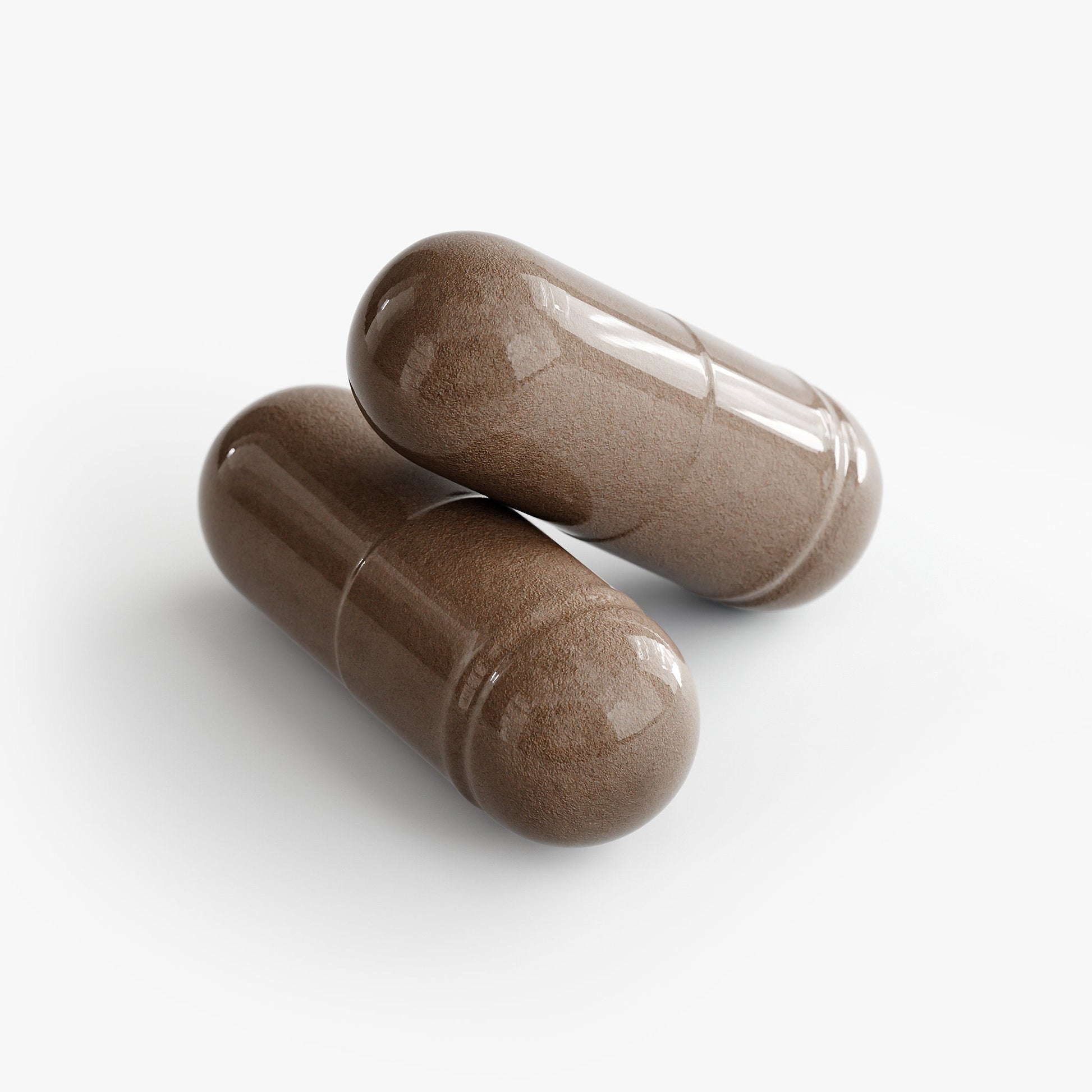 Brown capsule pair for supplement use.