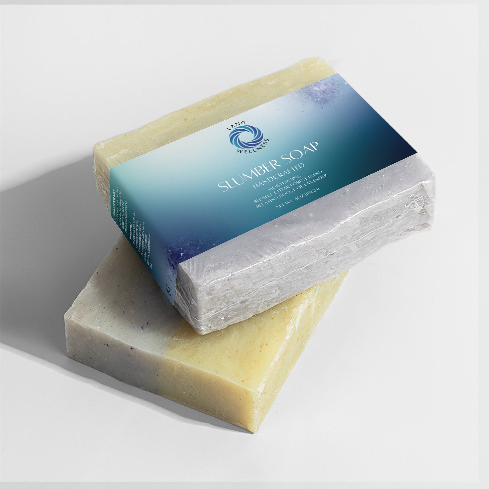 Slumber Soap bar stack, pale yellow and blue-white layers, rectangular bars
