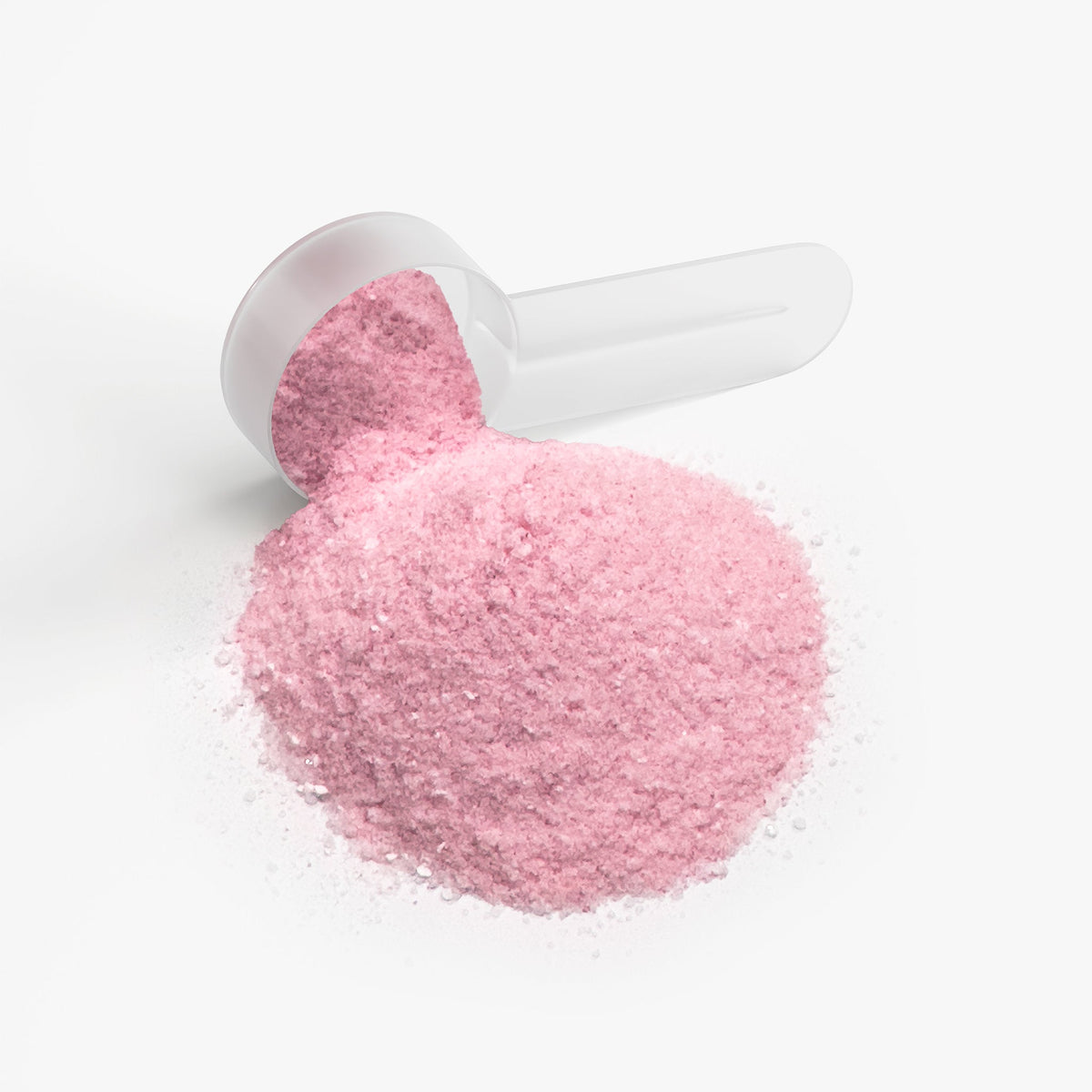 Pink fruit punch energy powder in a white scoop