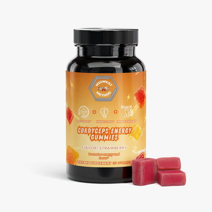 Energy gummy supplement bottle with strawberry gummies pieces beside it
