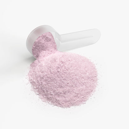Open scoop filled with pink-purple hydration powder
