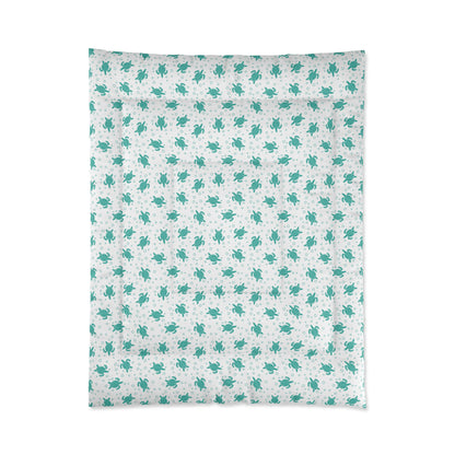 Comforter with teal all-over floral pattern on white, front view