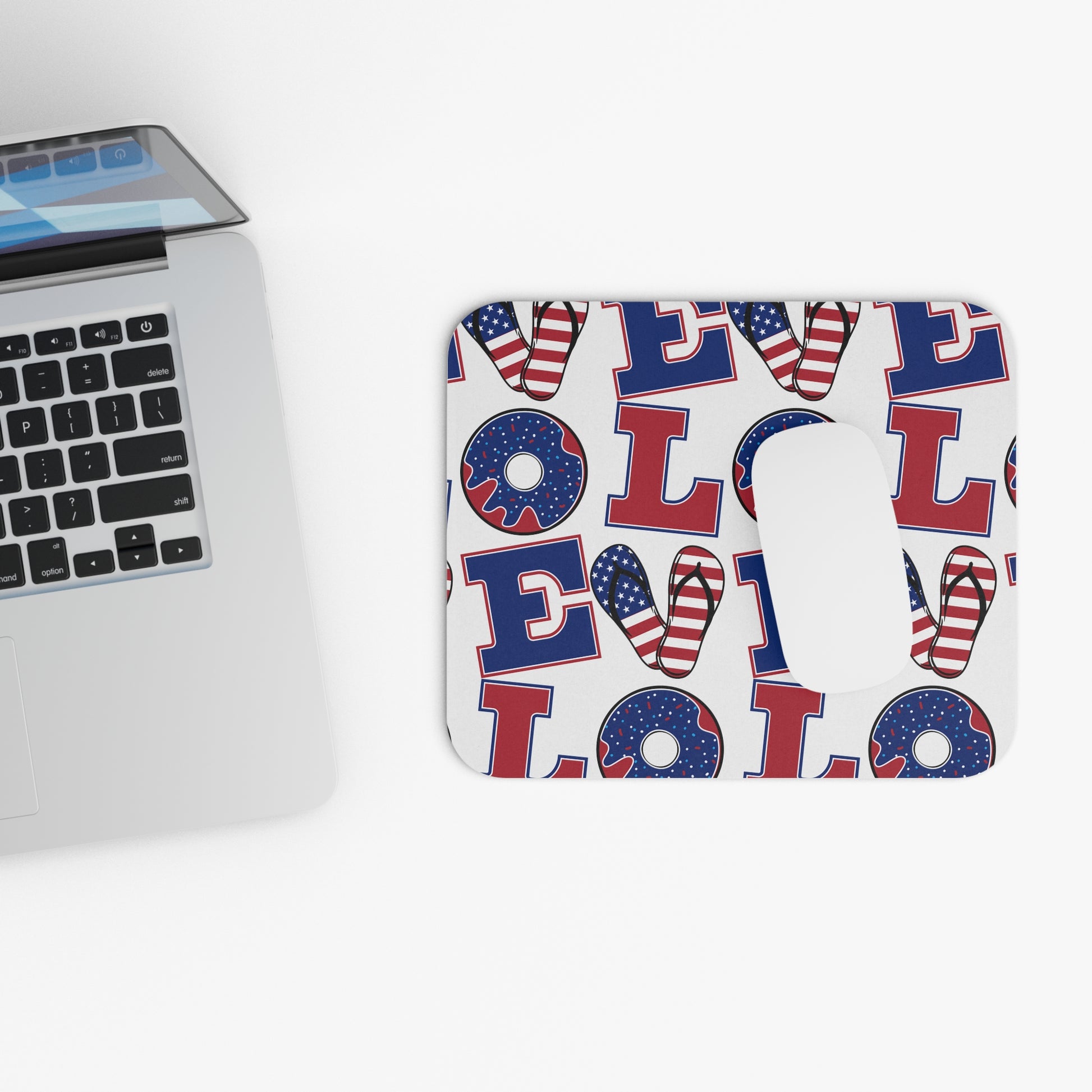 Rectangular patriotic mouse pad with blue red white letters, donuts, and flip-flops