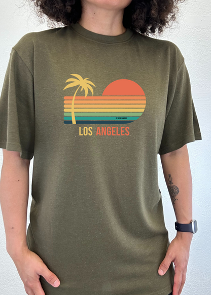 Olive green unisex graphic short-sleeve T-shirt with palm, sunset, and “Los Angeles” print