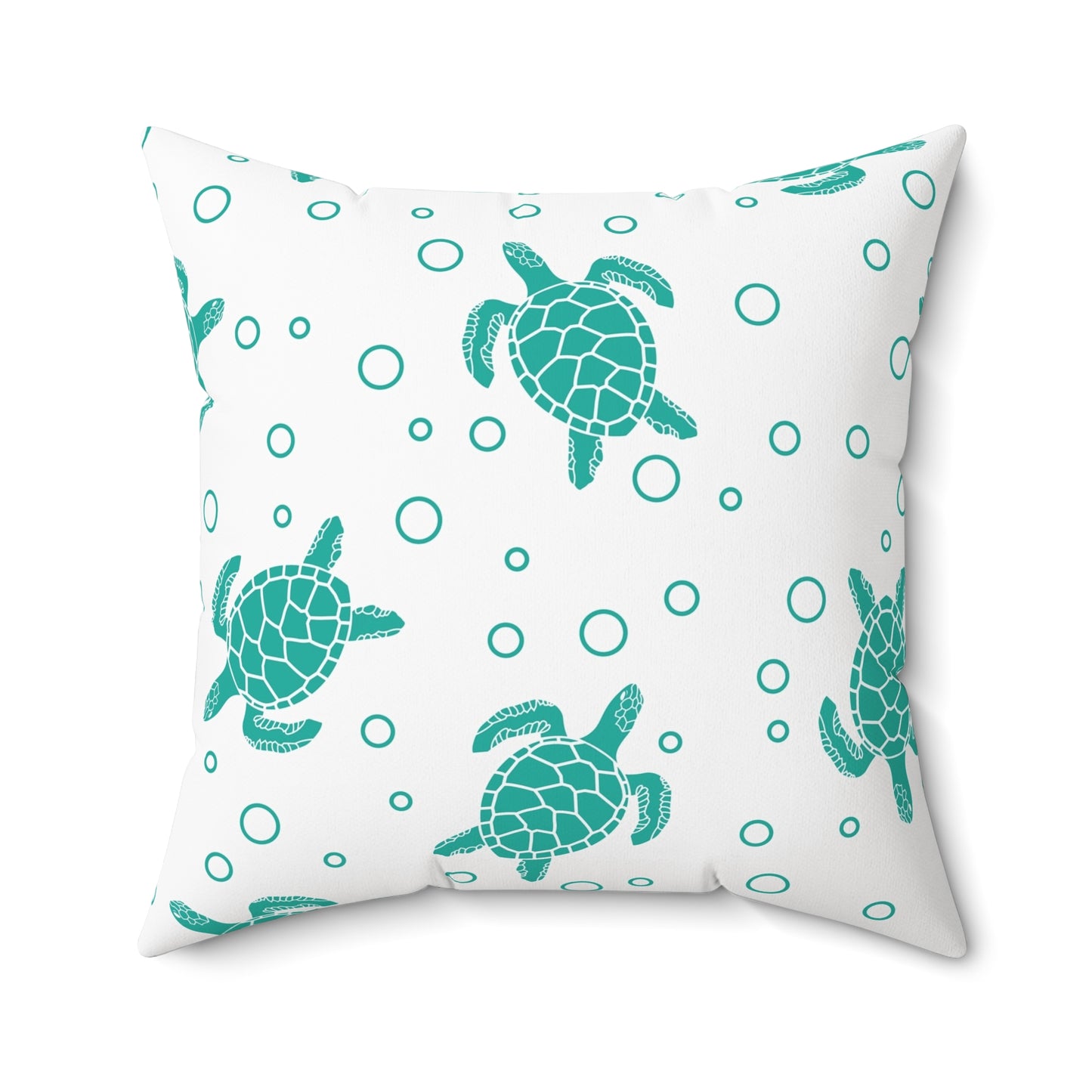 Square decorative pillow with teal turtle design and teal circle pattern on white background