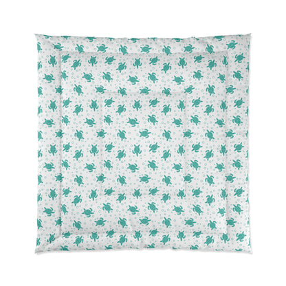 Comforter with teal all-over floral pattern on white, shown flat with aligned edges