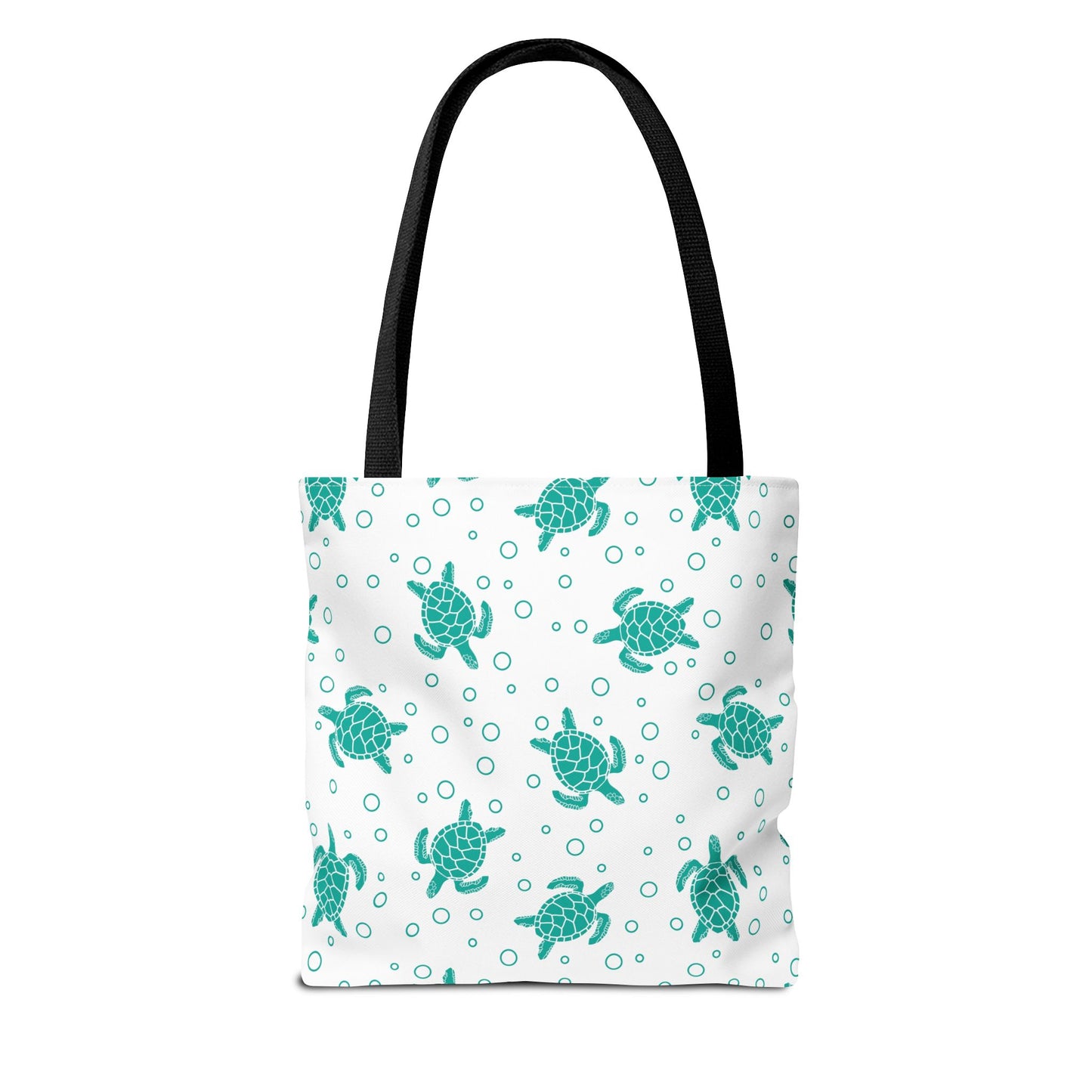 Sea turtle pattern tote bag with teal turtles on white background and black handles, side view