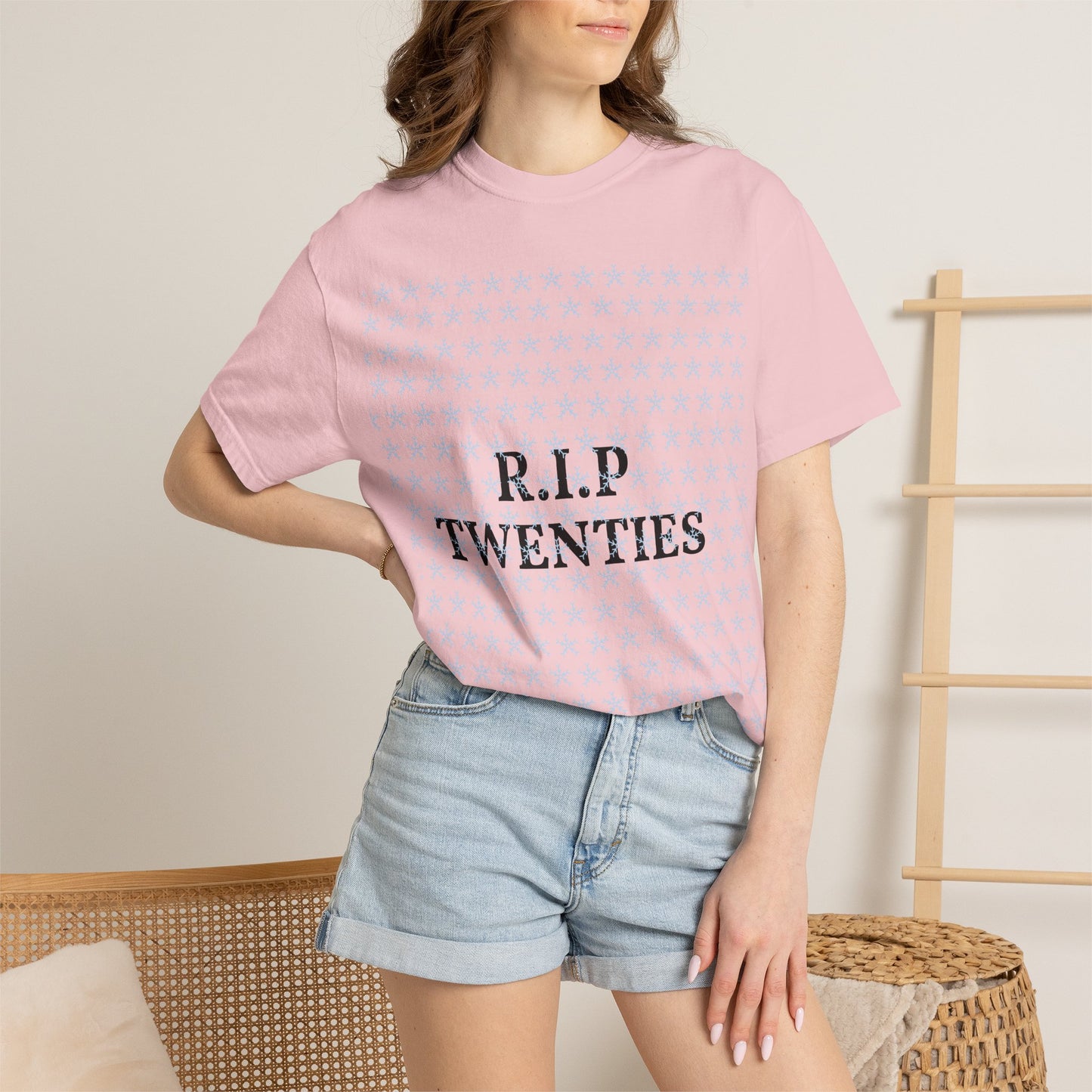 Unisex garment-dyed T-shirt in blossom pink with snowflake pattern and R.I.P Twenties graphic