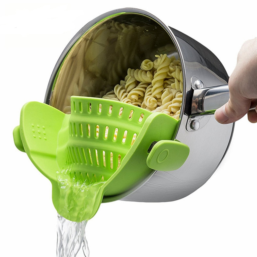 Green silicone snap-and-strain filter with perforated basket and snap handle