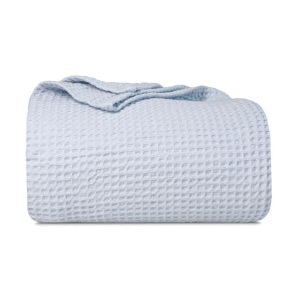 Waffle weave blanket, folded light blue with waffle texture and rolled edge